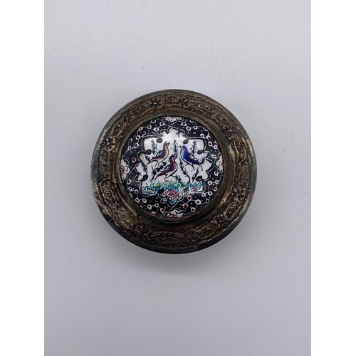 559 - PERSIAN WHITE METAL CYLINDRICAL BOX WITH RAISED ENAMELLED LID