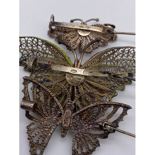 613 - BAG OF SILVER AND WHITE METAL FILIGREE AND WIRE WORK BUTTERFLY BROOCHES