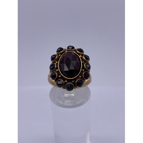 627 - UNMARKED YELLOW METAL GARNET CLUSTER RING AND PAIR OF SILVER GILT OVAL DROPPER EARRINGS