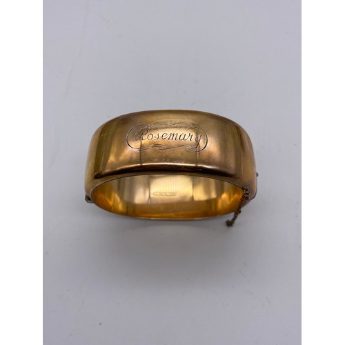 588 - CASED ROLLED GOLD ROSE COLOURED CUFF BANGLE WITH ENGRAVED DECORATION PLUS ONE OTHER AND A STAMPED 80... 