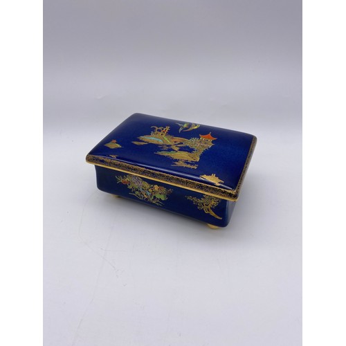 422 - CARLTONWARE BLUE LUSTRE PAGODA AND GILDED TABLE CIGARETTE BOX