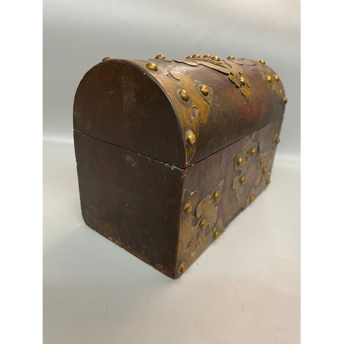 487 - VICTORIAN WALNUT AND BRASS STRAPWORK DOMED CASKET BOX