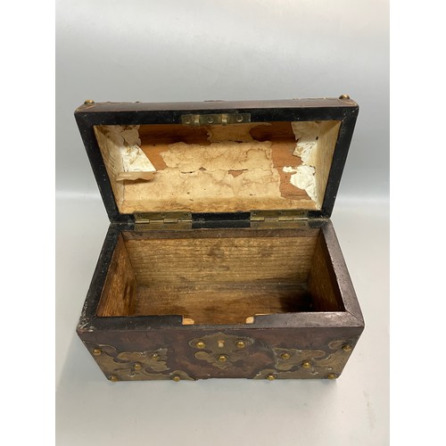 487 - VICTORIAN WALNUT AND BRASS STRAPWORK DOMED CASKET BOX