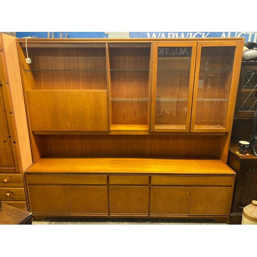 3 - 1970S TEAK WILLIAM LAWRENCE LONG GLAZED WALL UNIT WITH DRINKS CABINET