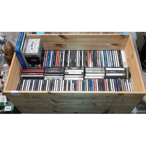 316 - WOODEN CRATE OF CD MUSIC VARIOUS AND TAPED CASSETTE MUSIC