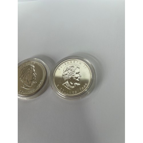 404 - THREE CANADIAN FINE ONE OUNCE SILVER FIVE DOLLAR COINS