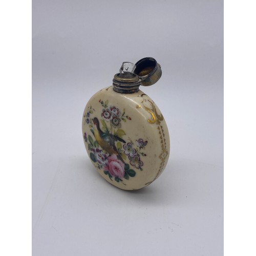 219 - WHITE METAL HINGED LID PORCELAIN MOON FLASK SCENT BOTTLE PAINTED WITH BIRDS AMIDST FLORAL SPRAYS