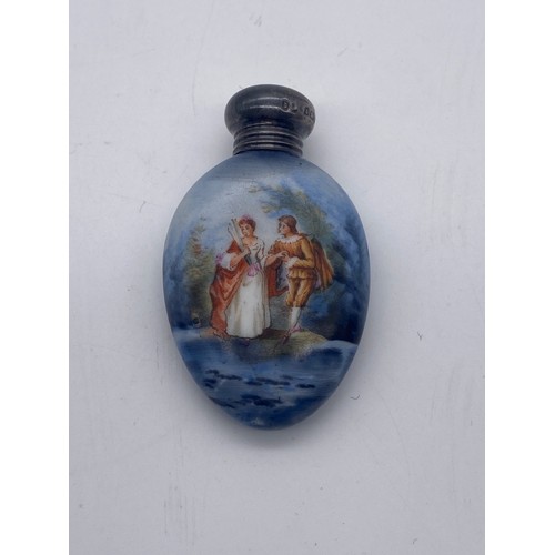 205 - BIRMINGHAM SILVER SCREW TOPPED OVAL SCENT PHIAL PAINTED WITH 18TH CENTURY COURTING COUPLE IN A LANDS... 