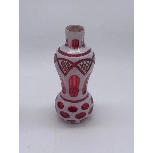 242 - VICTORIAN RUBY OVERLAY SHAPED SCENT BOTTLE (TOP BROKEN), AMETHYST ETCHED BOTTLE AND STOPPER, GILT DE... 