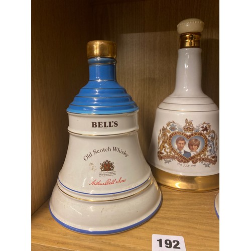 192 - THREE WADE ROYAL COMMEMORATIVE BELLS WHISKY DECANTERS