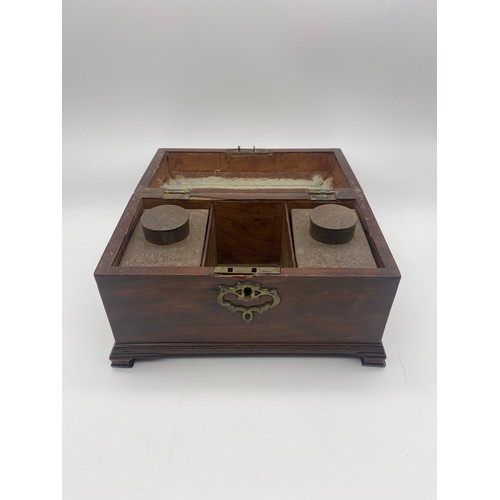 583 - MID 18TH CENTURY MAHOGANY TEA CADDY ON BRACKET FEET