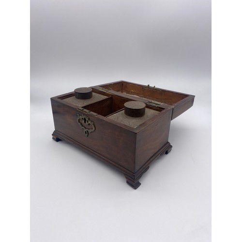 583 - MID 18TH CENTURY MAHOGANY TEA CADDY ON BRACKET FEET