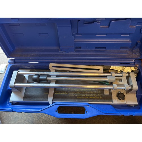 387 - CASED PROFESSIONAL TILE CUTTER AND FURNITURE TRANSPORT SET