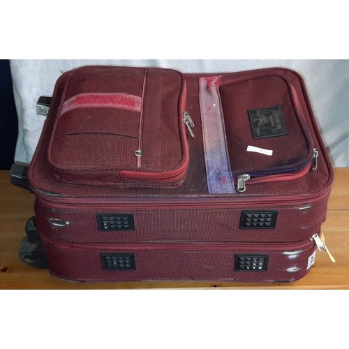 295 - BURGUNDY NYLON CASE CONTAINING STERLING GOLD ALMARK BOWLS