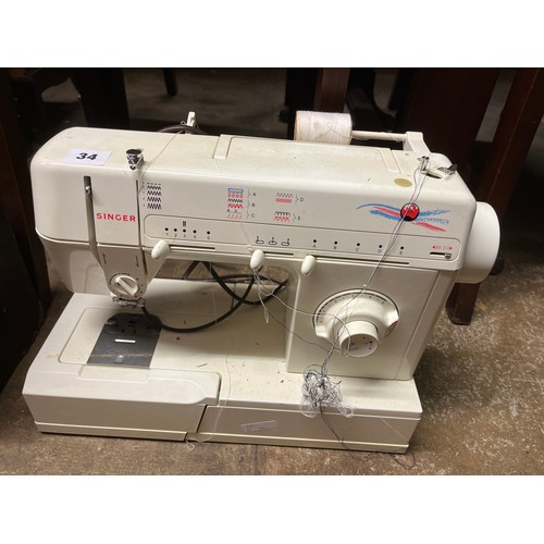 34 - SINGER ELECTRIC SEWING MACHINE WITH PEDAL