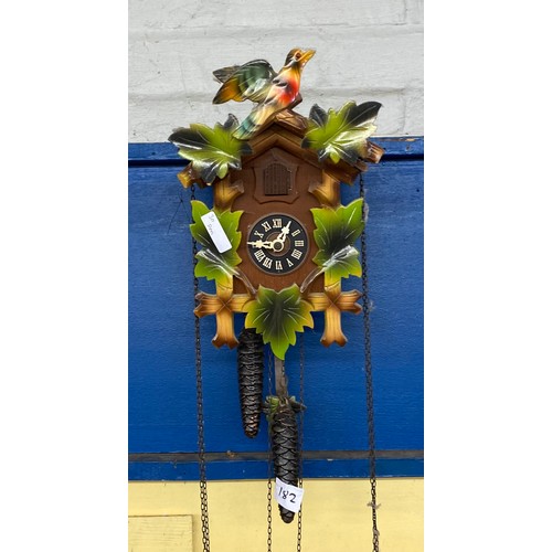 182 - CARVED AND PAINTED BAVARIAN STYLE CUCKOO CLOCK