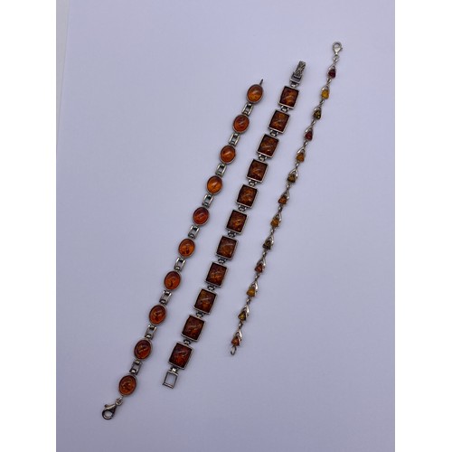 430 - THREE 925 SILVER AMBER BEAD BRACELETS