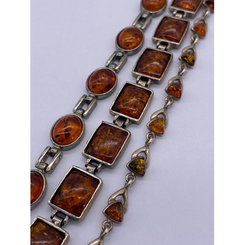 430 - THREE 925 SILVER AMBER BEAD BRACELETS