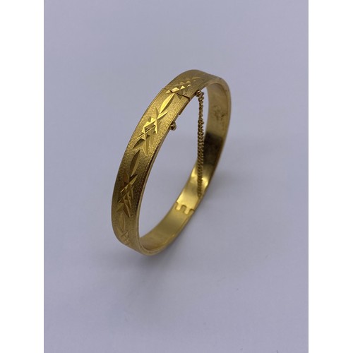 464 - ROLLED GOLD PLATED BLAZE CUT BANGLE WITH SAFETY CHAIN, AND 9CT GOLD LINK ID BRACELET (1.6G APPROX)