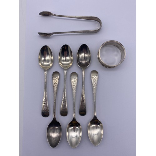 437 - SET OF SIX SHEFFIELD SILVER TEASPOONS MATCHING SUGAR TONGS, AND A BIRMINGHAM SILVER NAPKIN RING 4.8 ... 