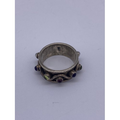 423 - 10 SILVER AND WHITE METAL ENAMEL AND  AND SEMI PRECIOUS STONE SET DRESS RINGS 1.3OZT OVERALL