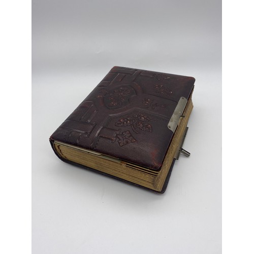 473 - LEATHER EMBOSSED BOUND PHOTOGRAPHIC PORTRAIT ALBUM CIRCA 1890-1910