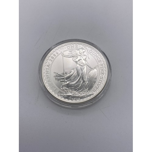 401 - BOX OF 12 ONE OUNCE SILVER BRITANNIA COMMEMORATIVE CROWNS, AND A SILVER ONE DOLLAR KOOKABURRA