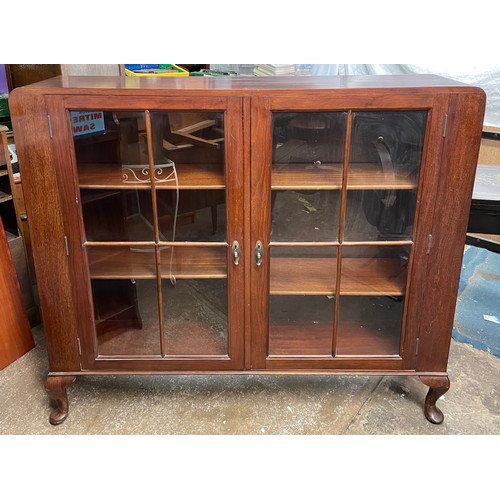 139 - MAHOGANY GLAZED CABINET ON BALL AND CLAW LEGS