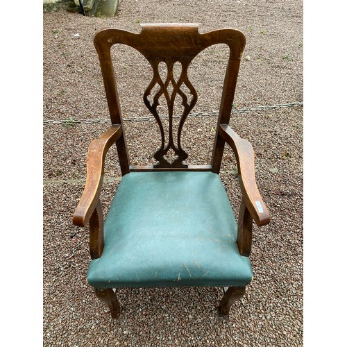 133 - EDWARDIAN OAK PIERCED FIDDLE BACK ELBOW CHAIR