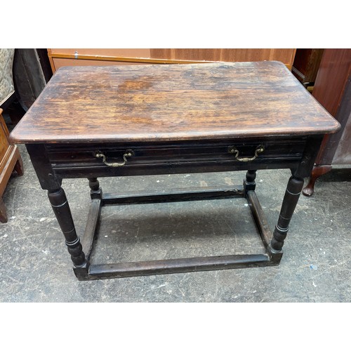 69 - 17TH CENTURY AND LATER OAK SIDE TABLE WITH SHALLOW DRAWER ON RING TURNED LEGS UNITED BY STRETCHERS, ... 