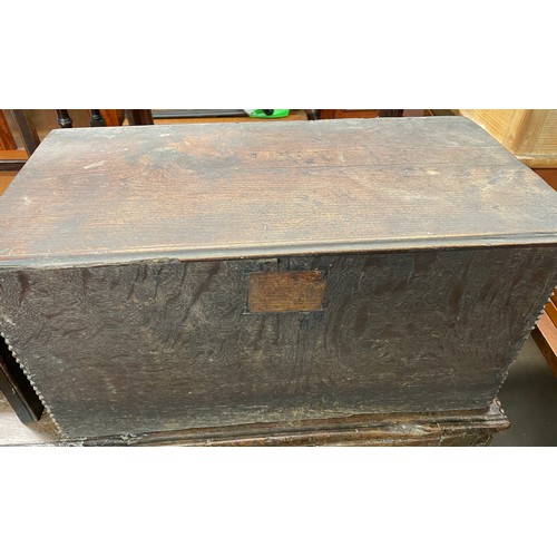 57 - 17TH CENTURY OAK BOX WITH A HINGED LID AND CHIP CARVED SIDES, 33CM D X 63.5CM W X 31CM H APPROX