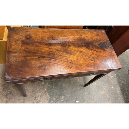 64 - GEORGE III MAHOGANY RECTANGULAR BAIZE LINED FOLDOVER CARD TABLE, 89CM W X 72.5CM H X 44CM D (WHILE F... 