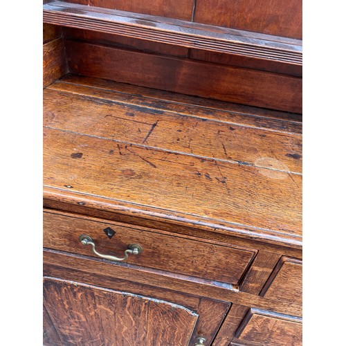 94 - GEORGE III OAK DRESSER WITH THREE SHELF PLATE RACK