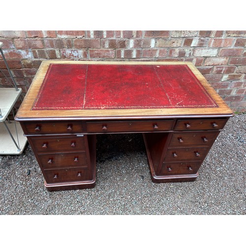 103 - VICTORIAN MAHOGANY NINE DRAWER KNEEHOLE DESK WITH INSET RED GILT TOOLED SKIVER