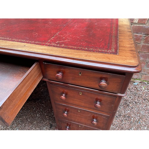 103 - VICTORIAN MAHOGANY NINE DRAWER KNEEHOLE DESK WITH INSET RED GILT TOOLED SKIVER