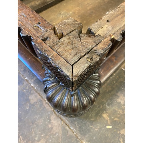 166 - 17TH CENTURY AND LATER OAK REFECTORY TABLE WITH A FIVE PLANK CLEATED TOP WITH CARVED EDGE ON HEAVILY... 