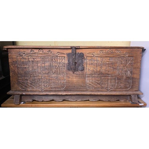 198 - 17TH CENTURY ITALIAN WALNUT FRUITWOOD CASSONE WITH CARVED ARMORIAL SHIELDS, 125CM W X 52CM H X 48CM ... 