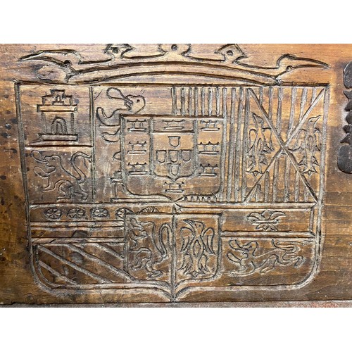 198 - 17TH CENTURY ITALIAN WALNUT FRUITWOOD CASSONE WITH CARVED ARMORIAL SHIELDS, 125CM W X 52CM H X 48CM ... 