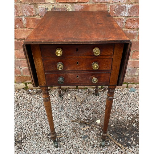 144 - REGENCY MAHOGANY AND EBONY STRUNG DROP FLAP TABLE ON RING TURNED TAPERED LEGS