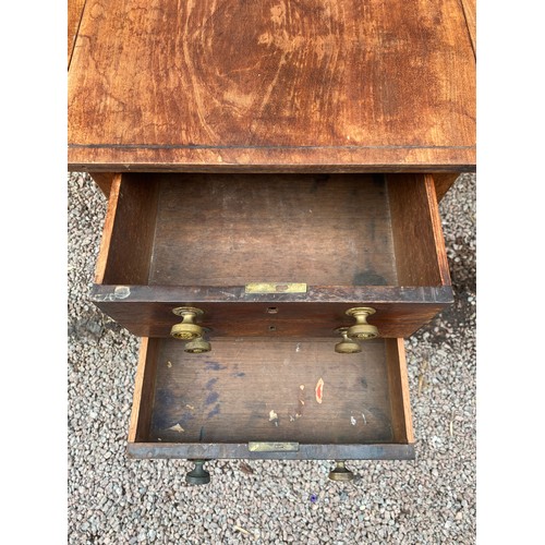 144 - REGENCY MAHOGANY AND EBONY STRUNG DROP FLAP TABLE ON RING TURNED TAPERED LEGS