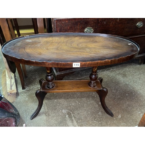 115 - REPRODUCTION MAHOGANY OVAL WAVY EDGED OCASSIONAL TABLE