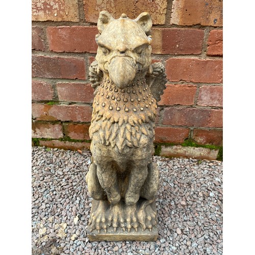 394 - PAIR OF STONEWORK SEATED GRIFFINS 56cm H