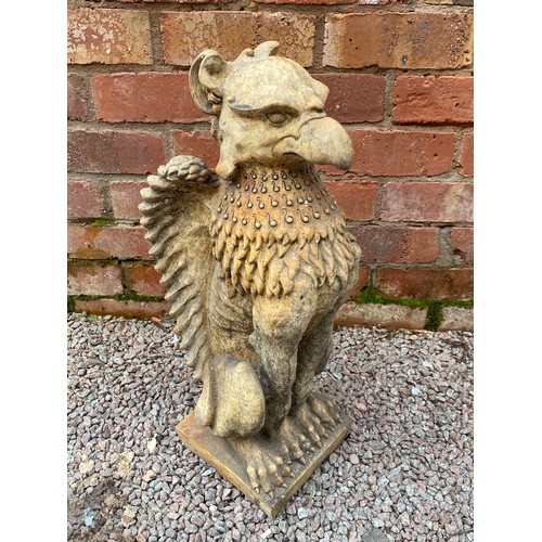 394 - PAIR OF STONEWORK SEATED GRIFFINS 56cm H