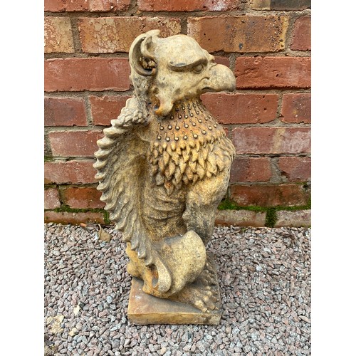 394 - PAIR OF STONEWORK SEATED GRIFFINS 56cm H