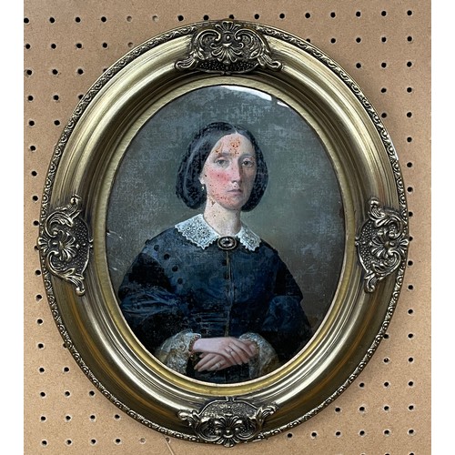 284 - UNSIGNED 19TH CENTURY SCHOOL CANVAS LAID ON BOARD OVAL PORTRAIT OF A 19TH CENTURY FEMALE IN MOURNING... 