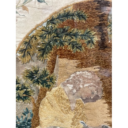 286 - BERLIN NEEDLE WORKED PANEL OF A SEATED LADY WRITING ON A SILK FLORAL BORDER 31CM X 40CM APPROX