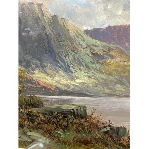 294 - A RAMSEY? OILS ON BOARD HIGHLAND LOCH LANDSCAPE SIGNED AND DATED 1916 A PAIR 54CM X 19CM APPROX