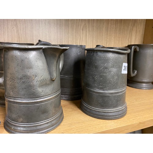 365 - SHELF OF 18TH/19TH CENTURY PEWTER LARGER QUART MEASURES AND TANKARDS SOME WITH ENGRAVING