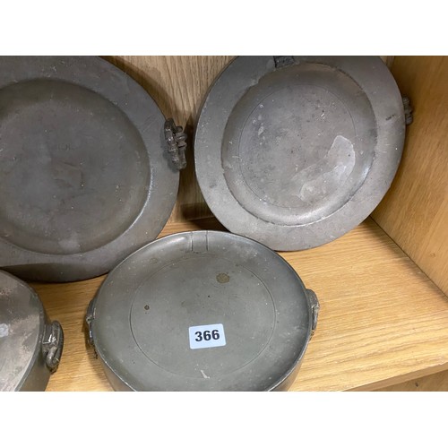 366 - FIVE 19TH CENTURY PEWTER WARMING PLATES