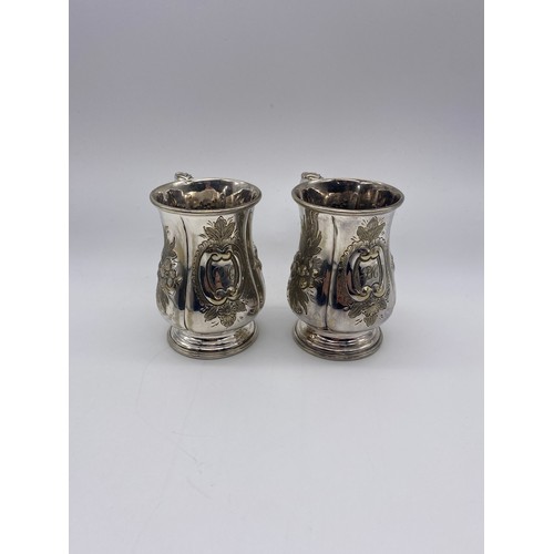 403 - PAIR OF UNMARKED PLATED TANKARDS WITH MONOGRAMMED CARTOUCHE